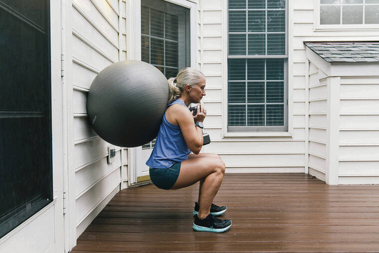 NEW YORK TIMES
                                Alison Gittelman, an experienced marathoner and triathlete, uses weights while exercising at her home in Chantilly, Va. Gittelman incorporated more strength training into her exercise routine once she entered menopause.