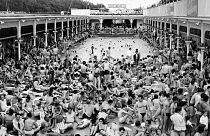 Parisians enjoy the "Deligny" swimming-pool during a heatwave in Paris, France. June, 16, 1957