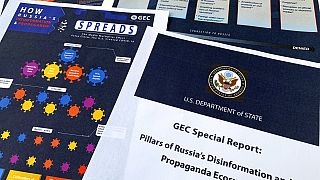 Pages from the U.S. State Department's Global Engagement Center report released on Aug. 5, 2020, are seen in this photo.