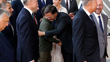 Incoming NATO chief Mark Rutte greets Ukraine's President Volodymyr Zelenskyy at an EU summit in Brussels, Thursday, June 27, 2024. 