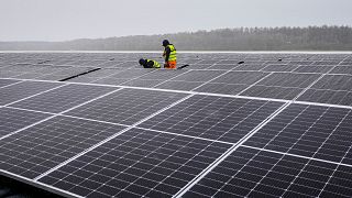  Solar panels are installed at a floating photovoltaic plant on a lake in Haltern, Germany.