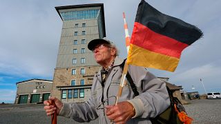 FILE - Benno Schmidt hikes to the Brocken on German Unity Day, Schierke, Germany, on 3 October, 2020. 