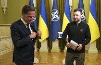 NATO Secretary General Mark Rutte, left, and Ukrainian President Volodymyr Zelenskyy leave the hall after a joint press conference in Kyiv, October 3, 2024