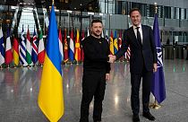 NATO Secretary General Mark Rutte, right, shakes hands with Ukraine's President Volodymyr Zelenskyy prior to a meeting at NATO headquarters in Brussels, Thursday, Oct. 17, 202