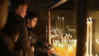 Faithful pray at the Church of the Nativity, traditionally believed to be the birthplace of Jesus, in the West Bank city of Bethlehem, Tuesday, Dec. 24, 2024