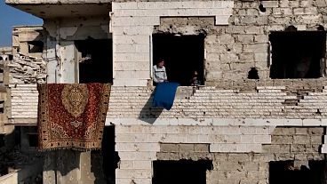 Syrian elderly couple return to ruined home in ghost town Damascus` suburb Harasta