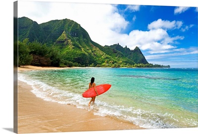 Hawaii, Kauai, Haena Beach, Woman Entering Ocean With Surfboard