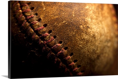 A closeup of an old baseball