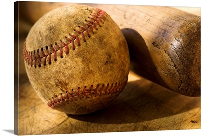 Antique baseball with baseball bat