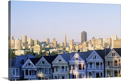 Houses with skyline cityscape behind it, Alamo Square, San Francisco