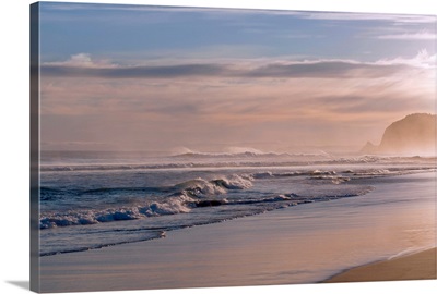 Looking down beach at St Kilda, Dunedin at sunset.