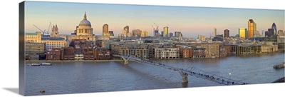 St Paul's Cathedral and City Skyline viewed over the Millennium Bridge at Dusk