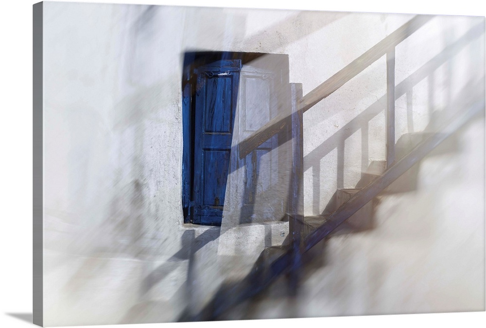 Ghostly image of a blue shuttered window along a set up steps with the shadow of the railings running up the wall.