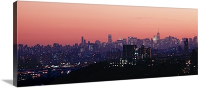 High angle view of buildings lit up at dusk, Manhattan, New York City, New York State