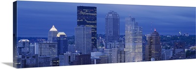 High angle view of skyscrapers lit up at dusk, Pittsburgh, Pennsylvania