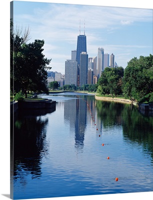 Reflection of buildings in a lagoon, Lincoln Park Lagoon, Lincoln Park, Chicago, Cook County, Illinois,