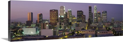 Skyscrapers lit up at dusk, City Of Los Angeles, California