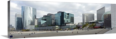 Tourists at a Town square, La Defense, Paris, Ile-de-France, France