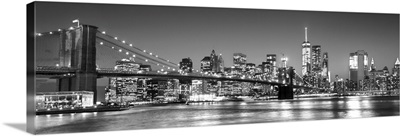 New York City Skyline with Brooklyn Bridge in Foreground, at Night