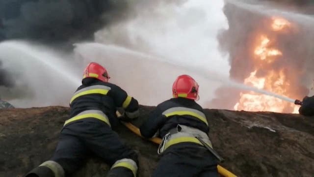 <p>Firefighterswork after a missile hit a build at Vinnytsia Airport</p>