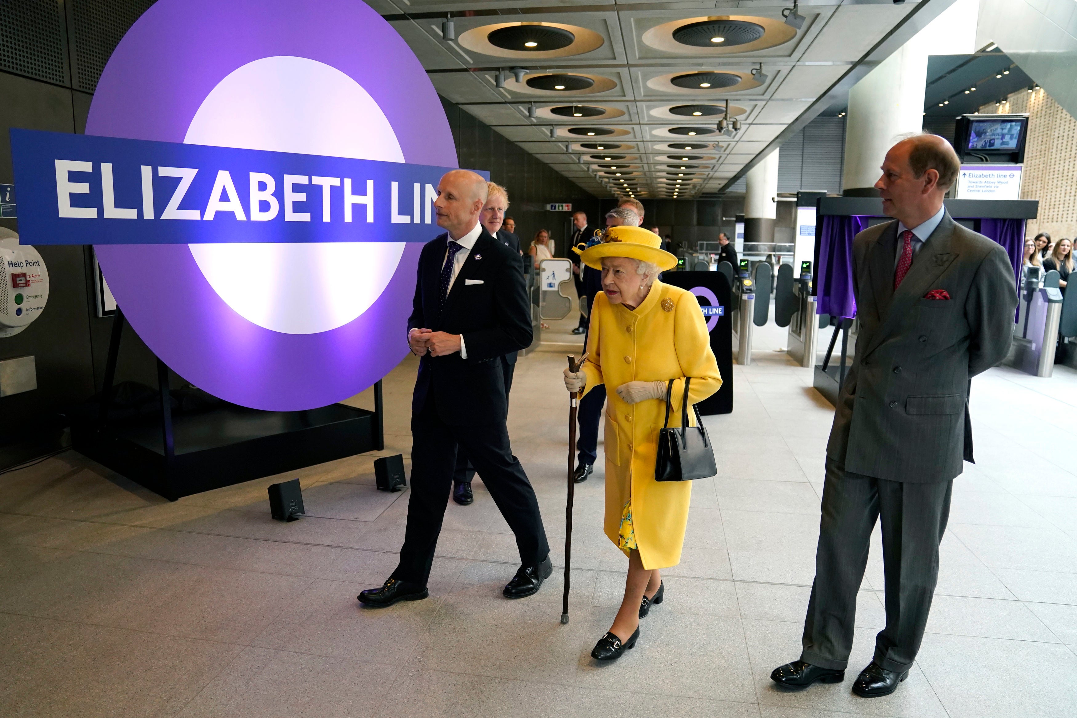 Queen Elizabeth II and Prince Edward, Earl of Wessex (R) mark the Elizabeth line's official opening at Paddington Station on May 17, 2022