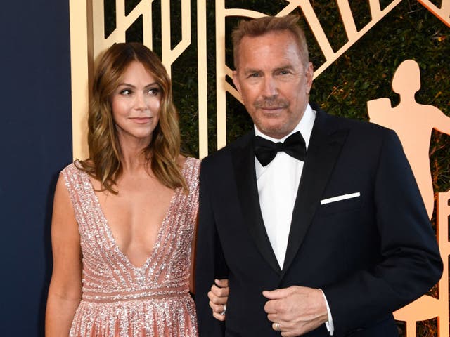 <p> Kevin Costner and his wife Christine Baumgartner arrive for the 28th Annual Screen Actors Guild (SAG) Awards at the Barker Hangar in Santa Monica, California, on February 27, 2022</p>