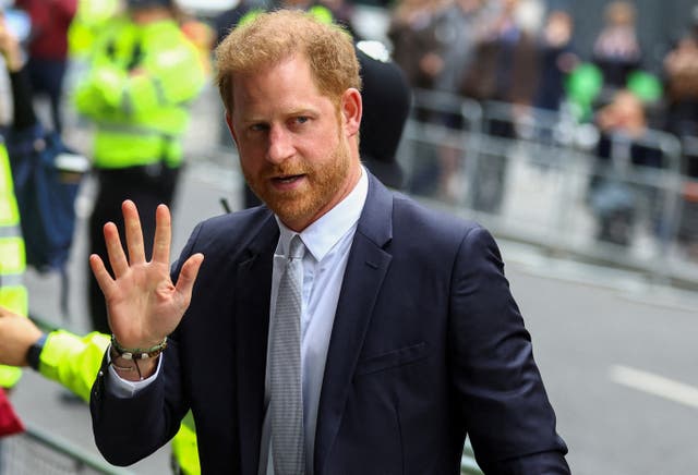 <p>The duke walks outside the Rolls Building of the High Court in London in June</p>