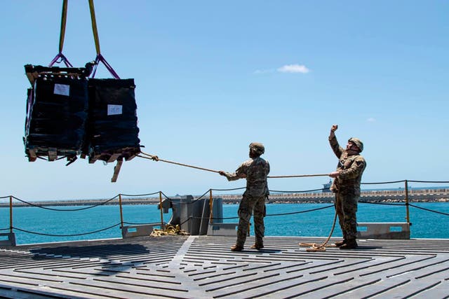 <p>Humanitarian aid arrives at the floating pier off the northern coast of Gaza</p>