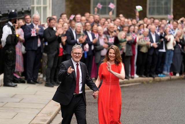 <p>‘Beaming from ear to ear, Starmer strolled up and down the crowd with wife Victoria while the cheers rang out’</p>