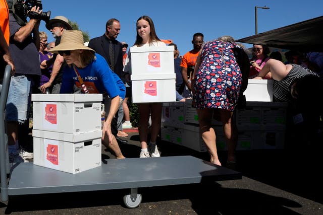 <p>Arizona abortion-rights supporters delivered over 800,000 petition signatures to the capitol to get abortion rights on the November general election ballot</p>