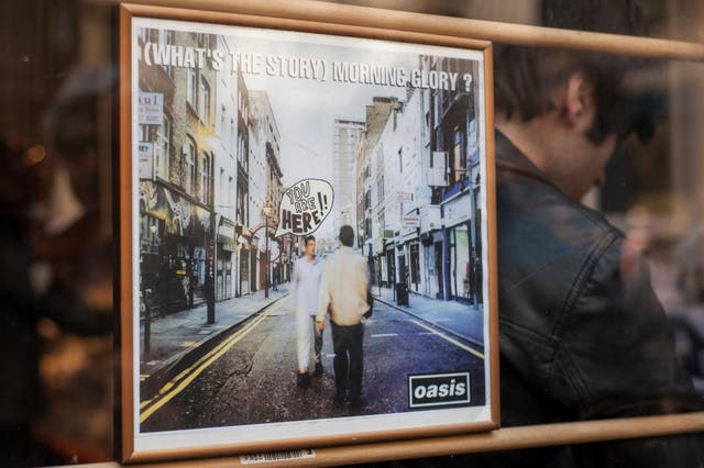 The Oasis (What’s The Story) Morning Glory album cover which depicted Berwick Street on its cover (Alamy/PA)