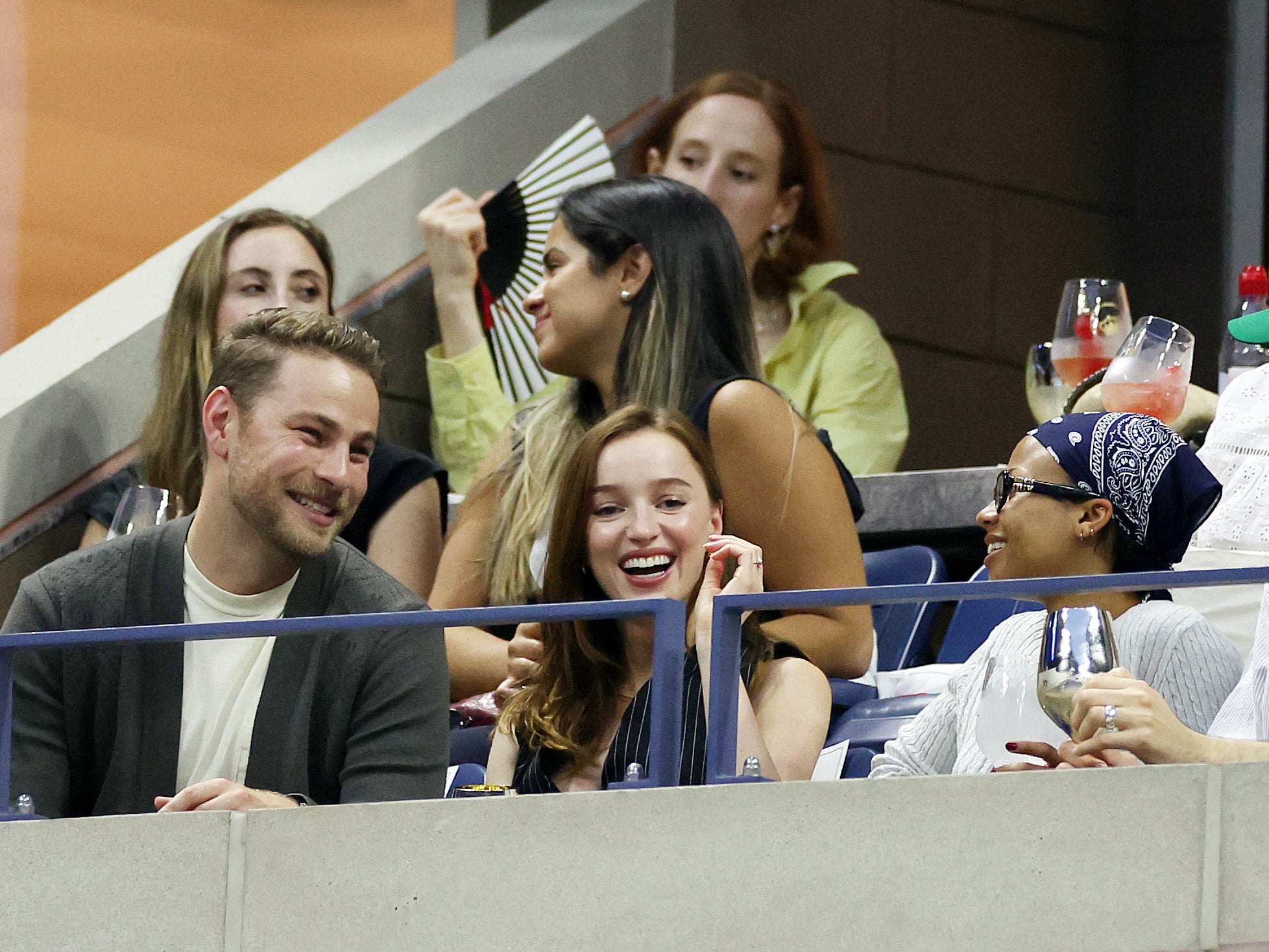 Phoebe Dynevor, Myha’la Herrold and Cameron Fuller attend Day One of the 2024 US Open at the USTA Billie Jean King National Tennis Center on 26 August