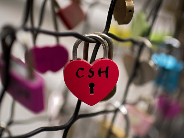 Love locks seen on a staircase during Valentine's Day in Beijing, 14 February 2018