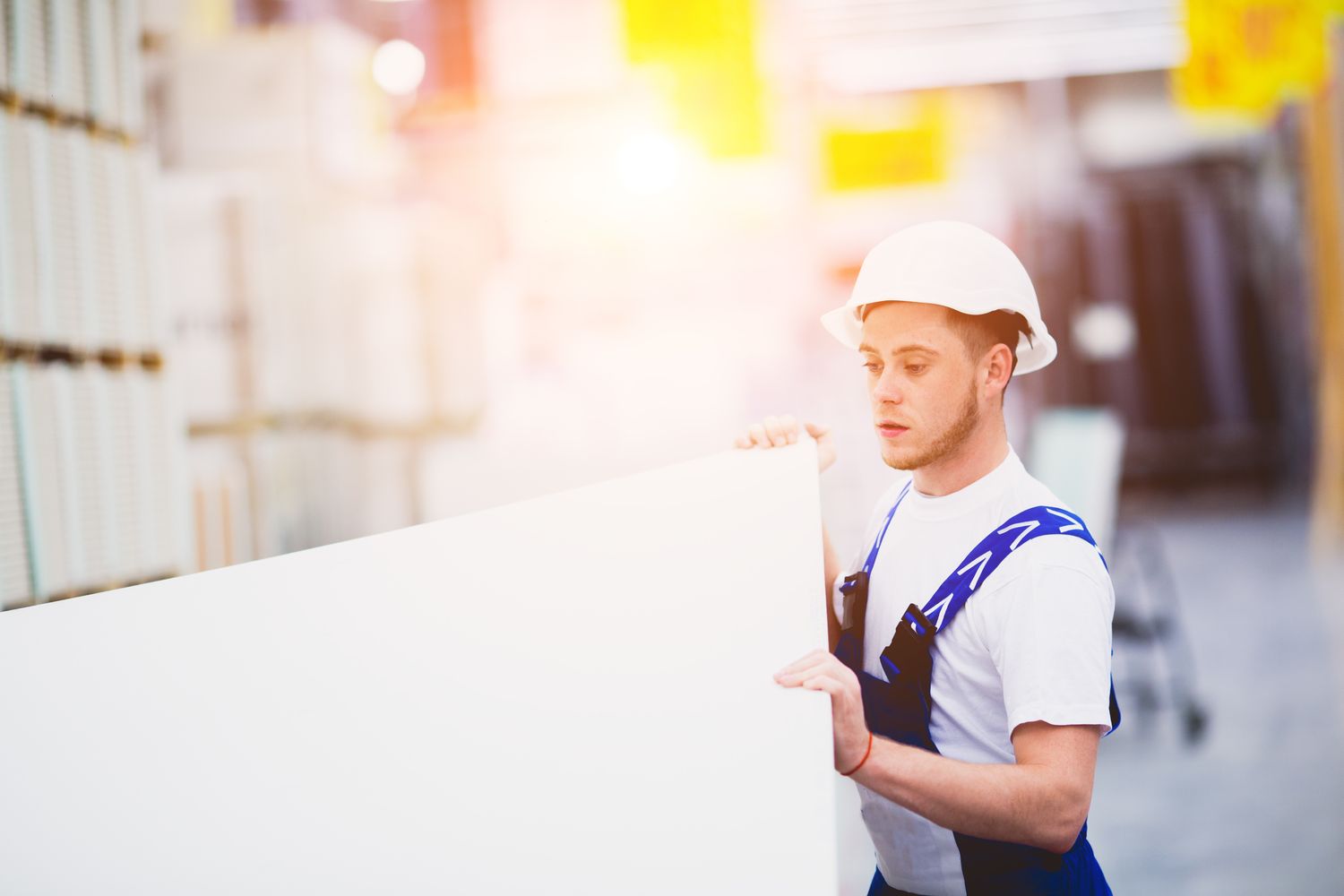 friendly hardware store assistant. happy male hardware store worker