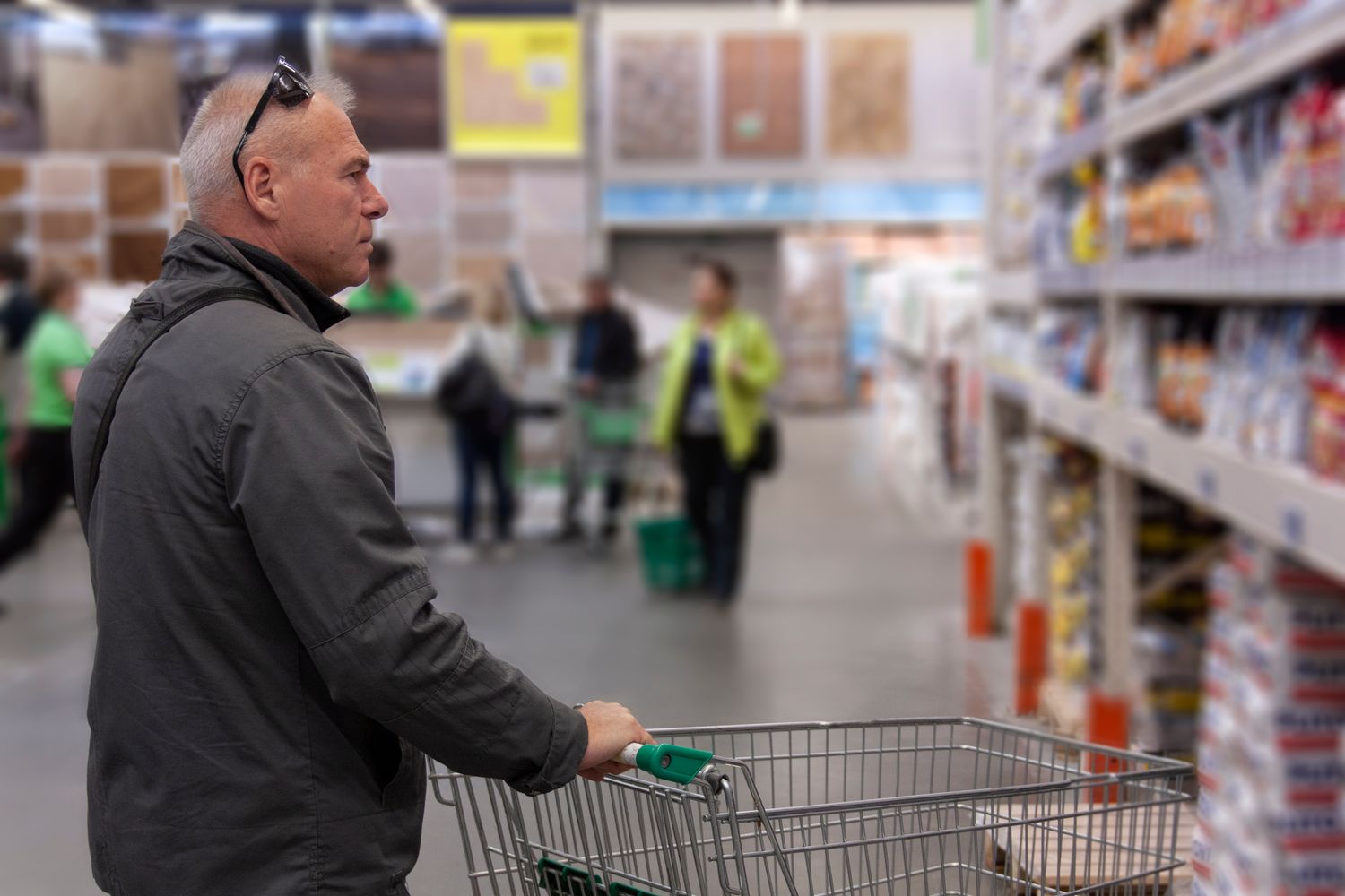 the man in the hardware store on blurred fone