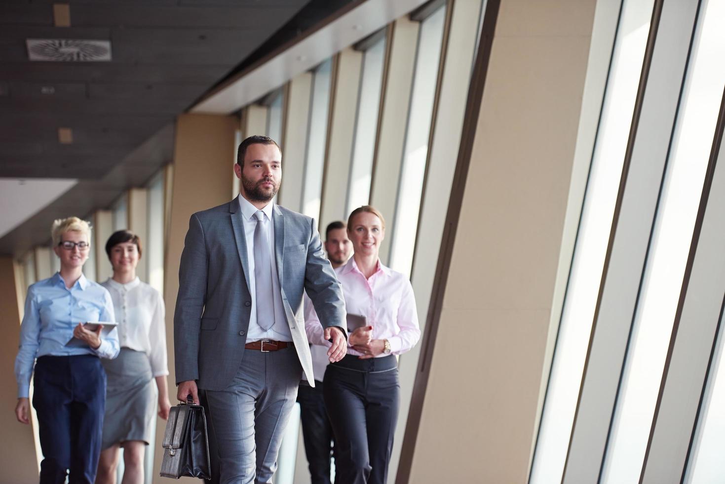 business people group walking photo