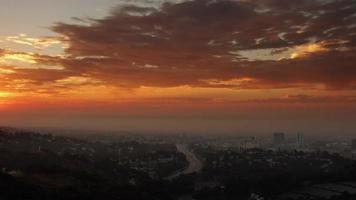 Time Lapse Clouds Float in a Sunrise over Los Angeles video