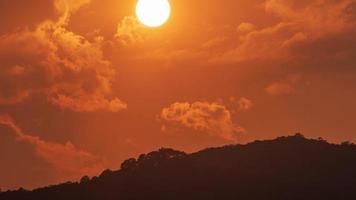 Timelapse of dramatic sunset with orange sky in a sunny day. video