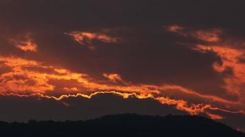 Timelapse of dramatic sunset with orange sky in a sunny day. video