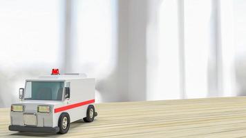 The  Ambulance on wood table for health care or medical concept 3d rendering photo