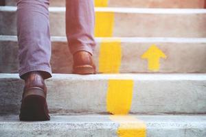 Business persons going up the stairs. photo