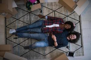 Top view of attractive young multiethnic couple photo