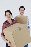 Young couple moving in new house photo