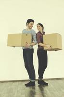 Young couple moving in new home photo