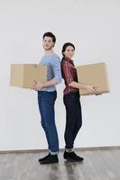 Young couple moving in new home photo