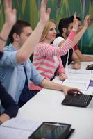 students group raise hands up photo