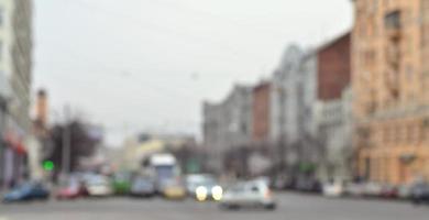 Blurred landscape with a city road during traffic photo