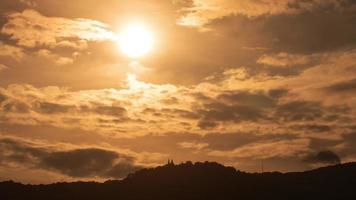 Sunset in the orange sky 4k time lapse video. Awesome landscape of sky and silhouette of mountain on the horizon. video