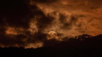 Timelapse of dramatic sunset with orange sky in a sunny day. video