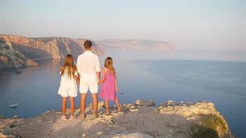 Happy beautiful family on a tropical beach vacation video